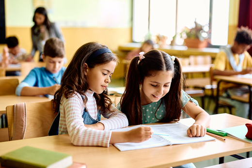 happy-schoolgirls-learning-together-on-a-class-at-2023-11-27-05-32-06-utc